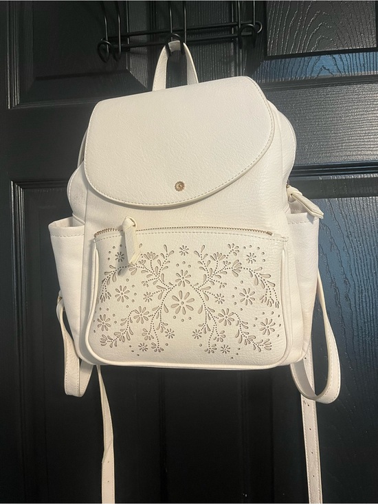 LC Lauren Conrad Handbags - LC Lauren Conrad Cream Faux Leather Backpack with Floral Cutouts